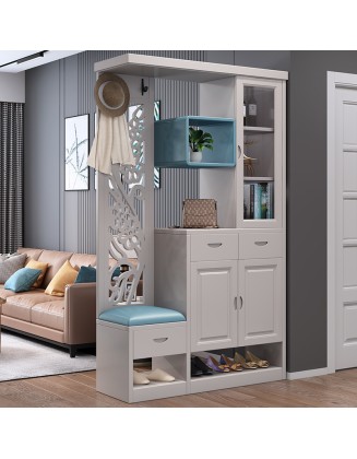 A foyer cabinet with a built-in stool