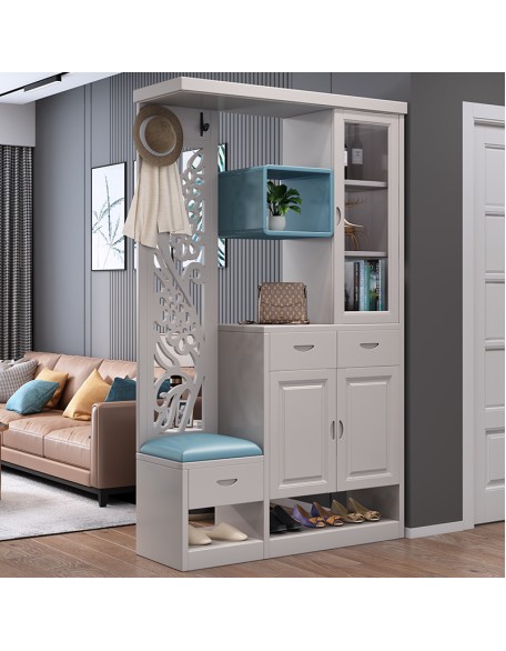 A foyer cabinet with a built-in stool